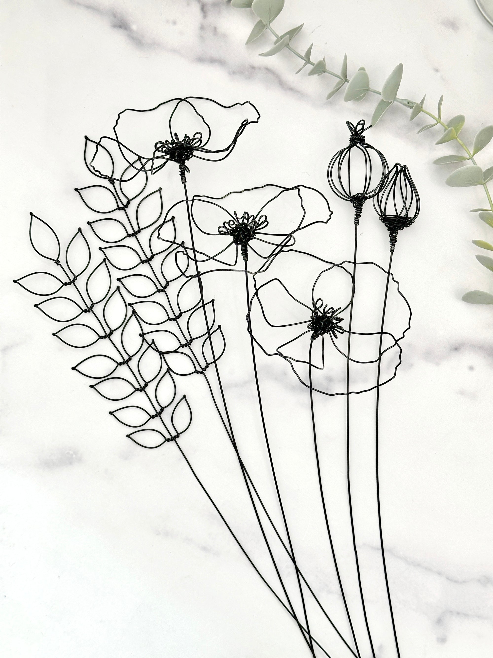 wire poppy flower arrangement